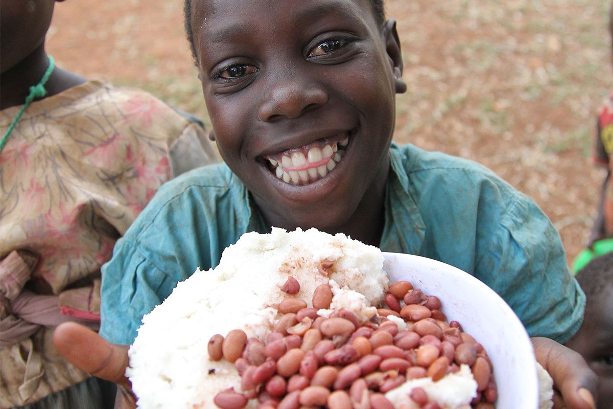 Children smiling together outdoors
