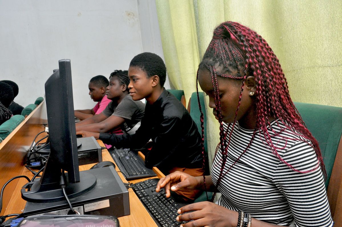 Young people learning digital skills together
